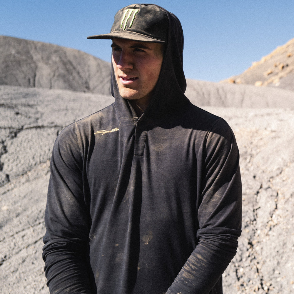 Kaidan Ingersoll standing in the desert wearing a Signature Rover UPF Hoodie