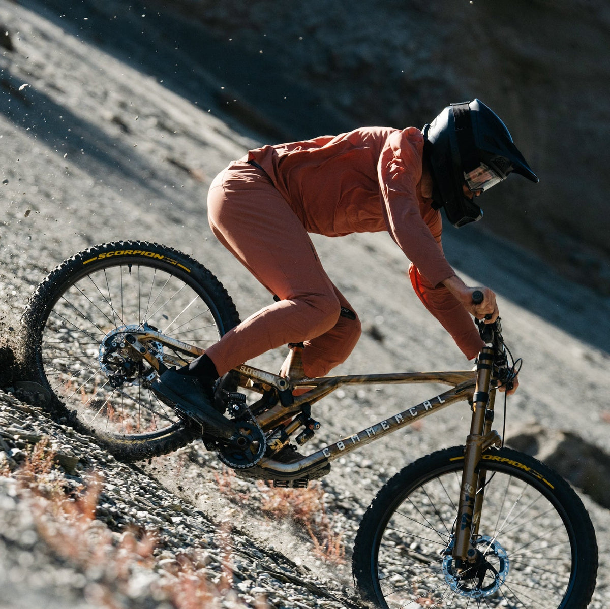 Brett Rheeder riding a downhill mountain bike wearing Signature Augusta Pants and Long Sleeve Jersey