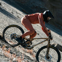 Brett Rheeder riding a downhill mountain bike wearing Signature Augusta Pants and Long Sleeve Jersey