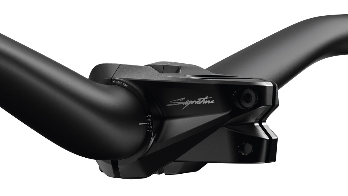 Close-up of a Signature Entra 35 handlebar mounted to Signature Entra stem on a white background